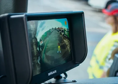 Brigade Camera Screen with Woman Walking