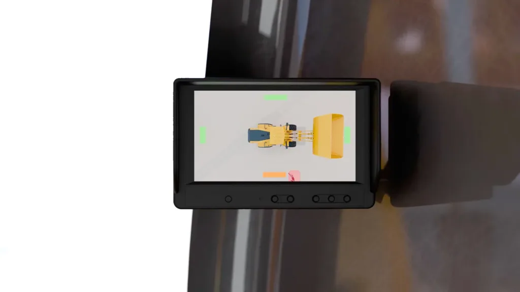 Draufsicht auf einen Lader auf einer Baustelle, dargestellt auf einem In-Can-Monitor.