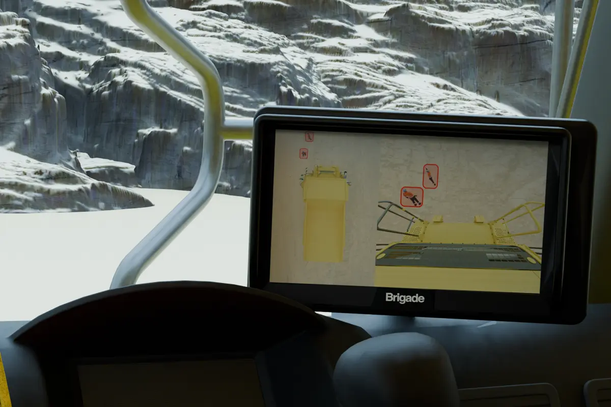 Workers shown being detected on a monitor inside an excavator on a quarry site by AI cameras 