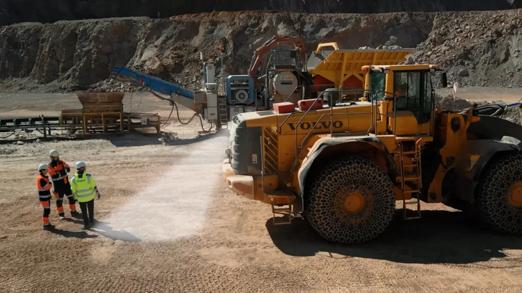 Workers on a quarry site being detected by a Brigade radar on the back of a reversing loader