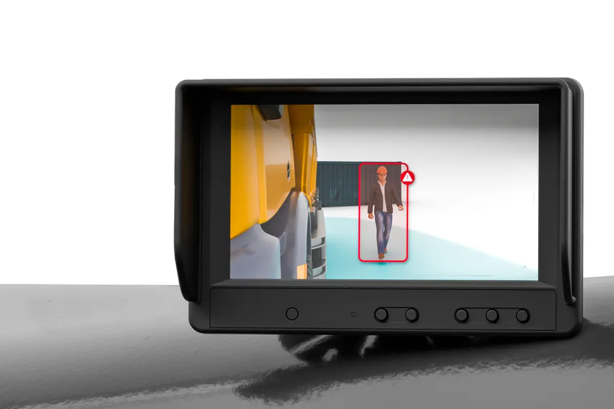Worksite operator being detected by an AI side camera and being shown on a monitor inside the cab of a vehicle.